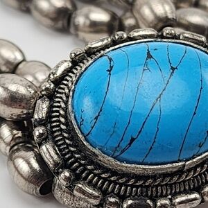 Three band silver beaded turquoise bracelet.